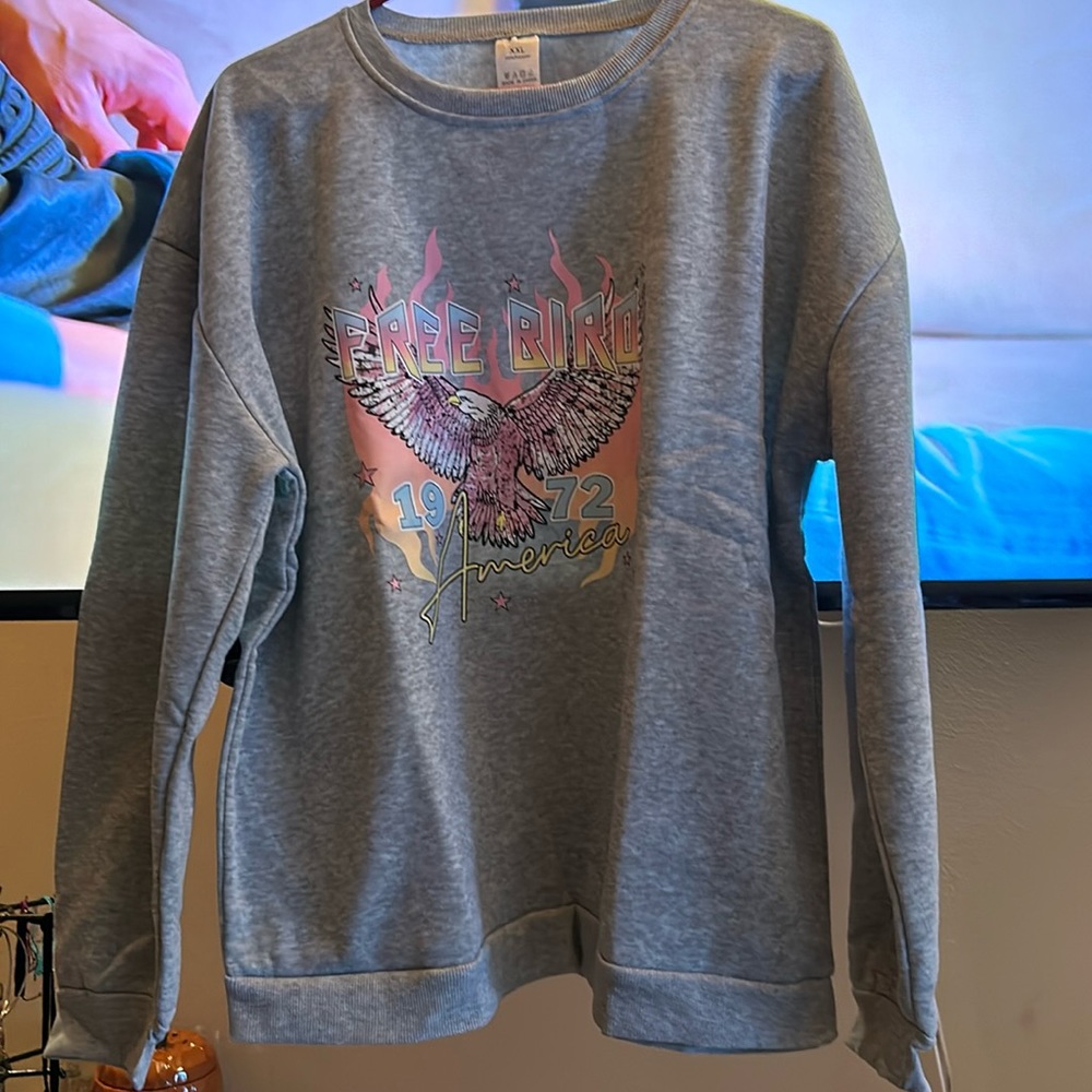 “free bird" sweatshirt size large women’s NWOT cute!